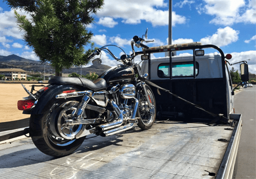 Motorcycle towing by Al Ain Recovery Service